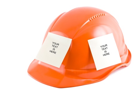 Protective helmet and note stickers on the white background.の写真素材