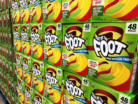 BAXTER, MN - 8 DEC 2019: Store display of Fruit by the Foot fruit snack in boxes for sale. Gluten free food in rolls.のeditorial素材