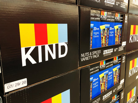 BAXTER, MN - 8 DEC 2019: Nutritious snack bars on display in a store. KIND LLC is a food company...
