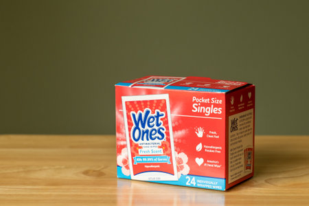 Box of individually packed Wet Ones wipes contains a product used to clean and sanitize a persons hands.のeditorial素材