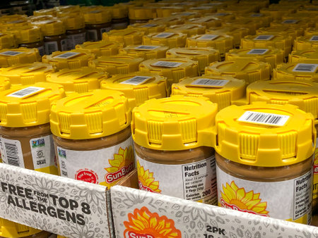 BAXTER, MN - 3 FEB 2021: Jars of SunButter spread on display in store.のeditorial素材