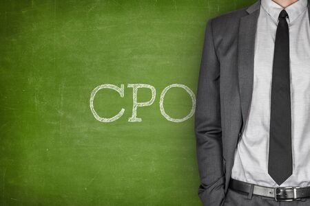 CPO on blackboard with businessman in a suit on sideの写真素材