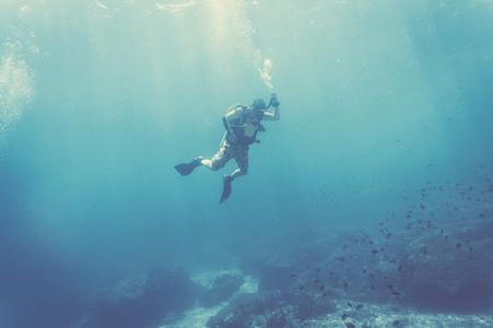Scuba diver underwaterの写真素材