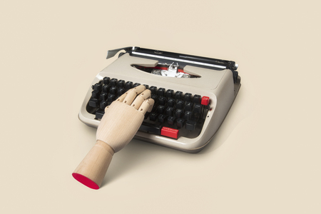 Vintage typewriter machine on isolated backgroundの写真素材