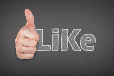 Like text on blackboard with businessman handの写真素材