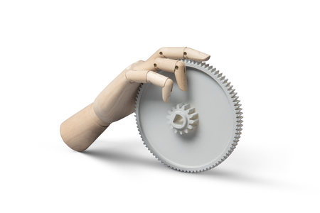 Cogwheel and hand isolated still lifeの写真素材