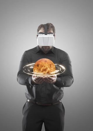 Businessman with virtual glassesの写真素材