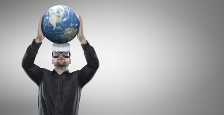 Businessman with virtual glasses, holding an earth image