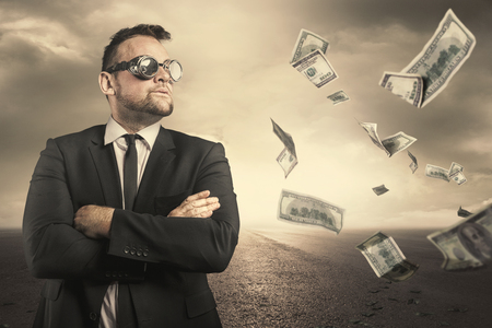 Businessman concept with dollar billsの写真素材