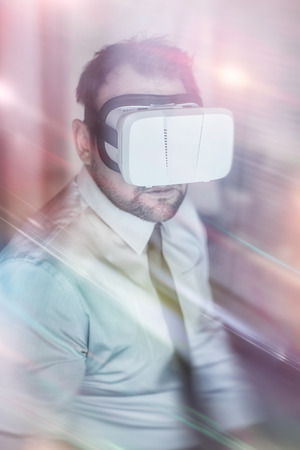 Businessman wearing virtual reality glassesの写真素材