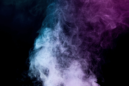 Colorful smoke on black backgroundの写真素材