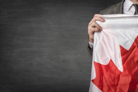 Businessman with Canada flagの写真素材