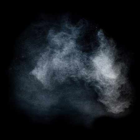 Dust cloud on black backgroundの写真素材