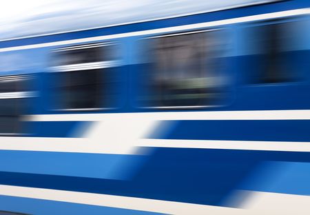 Blue speed train in motion