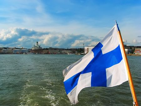 Panorama of Helsinki with Finnish flagの写真素材