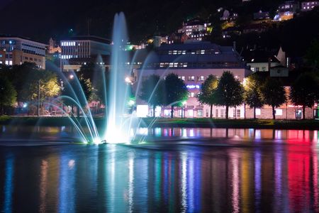 Night pond with fountain in Bergen, Norwayの写真素材