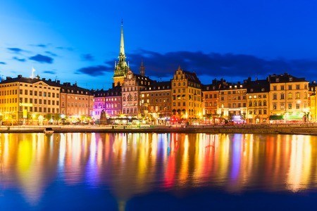 Scenic summer night panorama of the Old Town  Gamla Stan  architecture pier in Stockholm, Swedenの写真素材