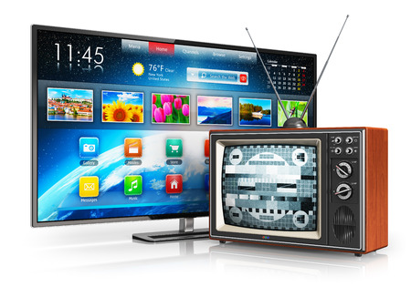 Creative abstract television evolution and digital multimedia technology and media entertainment concept  old wooden CRT TV with antenna and new modern smart tv with colorful interface isolated on white background with reflection effectの写真素材