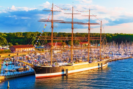 Scenic summer evening view of historical ship Passat in the Old Town pier of Travemunde, Germanyの写真素材