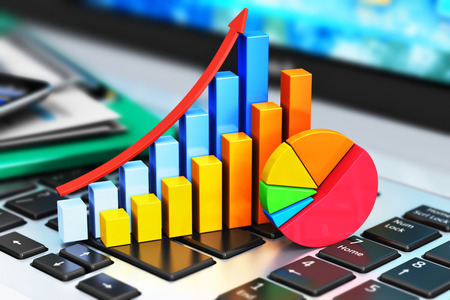 Creative abstract mobile office, stock exchange market trading, statistics accounting, financial development and banking business concept: color growth bar chart and pie diagram on modern laptop or notebook computer PC keyboard and other still life statioの写真素材