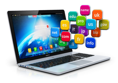 Creative abstract global internet communication PC technology and web telecommunication business computer concept: group of color icons with domain names and laptop or notebook isolated on white background with reflection effectの写真素材