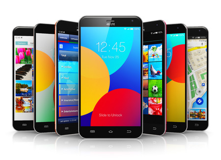 Creative abstract mobile phone wireless communication technology and mobility business office concept: group of modern metal black glossy touchscreen smartphones with colorful application interfaces with color icons and buttons isolated on white backgrounの写真素材