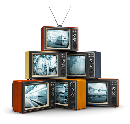 Creative abstract communication media and television channel broadcasting business concept: stack or pile of old retro color wooden home TV receiver sets with antenna isolated on white backgroundの写真素材