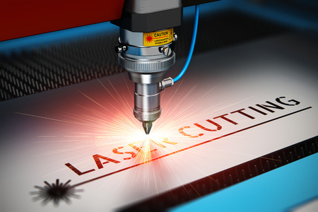 Laser cutting metal industry concept: macro view of industrial digital CNC - computer numerical control CO2 invisible laser beam cutter machine cutting stainless steel sheet with lot of bright shiny sparkles