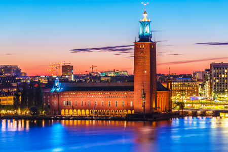 Scenic evening view of ancient City Hall palace and tower architecture building in the Old Town Gamla Stan of Stockholm, Swedenの写真素材