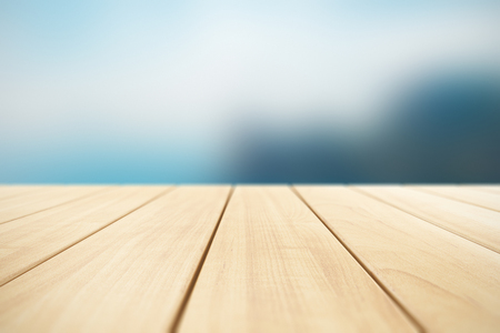 Creative abstract color retro background with wooden lumber planks or timber boards outdoors with selective focus effect and blurred natural background with bokehの写真素材