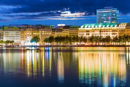 Scenic summer night view of the Old Town architecture and pier of Alster lake and river in Hamburg, Germanyの写真素材