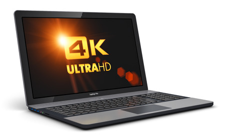 Creative abstract mobility PC computer web technology and internet communication concept: 3D render illustration of modern black glossy professional business laptop or office notebook with 4K UltraHD display screen resolution isolated on white backgroundの写真素材