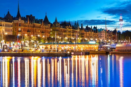 Scenic summer evening panorama of the Old Town (Gamla Stan) architecture pier in Stockholm, Swedenの写真素材