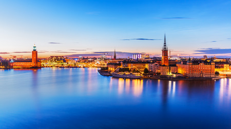 Scenic summer evening panorama of the Old Town (Gamla Stan) architecture pier in Stockholm, Swedenの写真素材