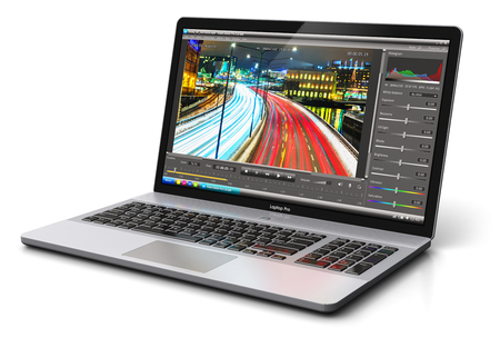 Creative abstract 3D render illustration of modern laptop or notebook computer PC with professional video footage editing production software program app on the screen display or monitor isolated on white background with reflection effectの写真素材