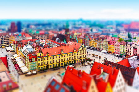 Scenic summer aerial panorama of the Old Town architecture and Market Square in Wroclaw, Poland with tilt shift selective focus effectの写真素材
