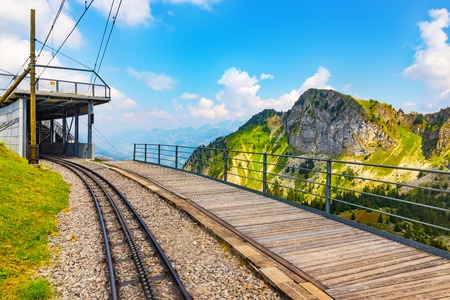 Scenic summer view of the cogwheel railway station on the way to Rochers de Naye mountain peak in Switzerlandの写真素材