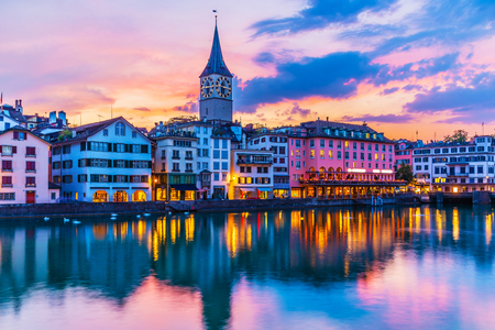 Scenic summer sunset view of the Old Town pier architecture and Limmat river embankment in Zurich, Swizerlandの写真素材