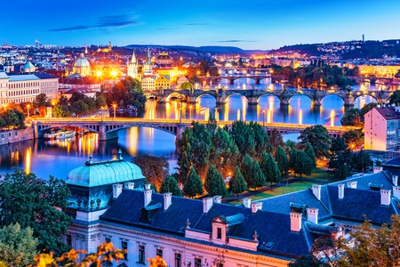 Scenic summer evening panorama of the Old Town architecture with Vltava river, Charles Bridge and St.Vitus Cathedral in Prague, Czech Republicの写真素材