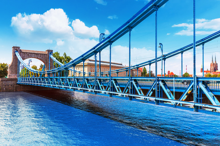 Scenic summer view of Grunwald Bridge over Oder river in the Old Town of Wroclaw, Polandの写真素材