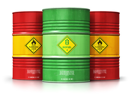 Creative abstract ecology, alternative sustainable energy and environment protection saving business concept: 3D render illustration of green biofuel or biodiesel barrel in front of the group of red metal oil, petroleum or gas drums isolated on white background with reflection effectの写真素材