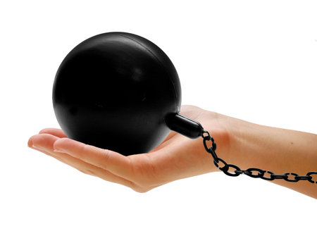  hand holding ball and chainの写真素材