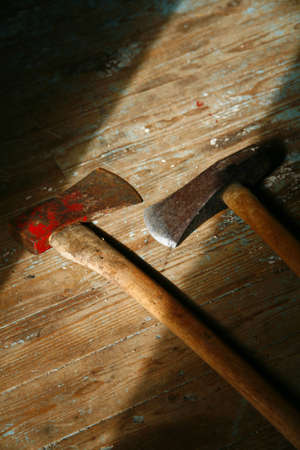 Old axe and sledgehammer in shedの写真素材