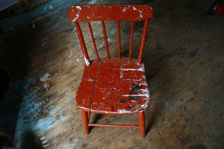 Old, dirty chair in a garageの写真素材