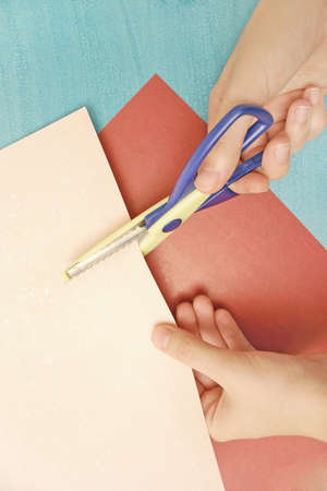 Scrapbooking paper and scissorsの写真素材