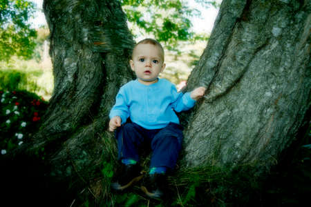 Adorable little boy playing in a parkの写真素材