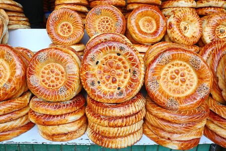 Flat cakes from tandoor on market counter in Bishkek, Kyrgyzstanの写真素材