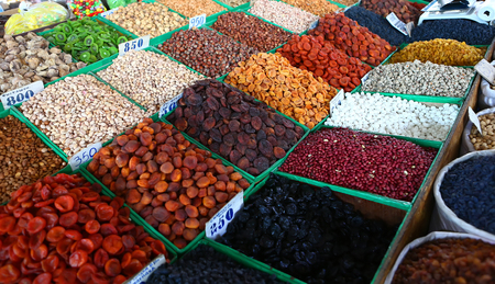 Counter in market with nuts and dried fruitsの写真素材