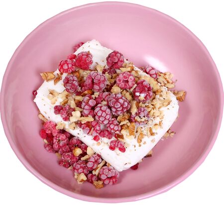 Healthy breakfast with cottage cheese, raspberry and walnutの写真素材