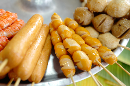 Grilled sausages and meat balls on Thai marketの写真素材